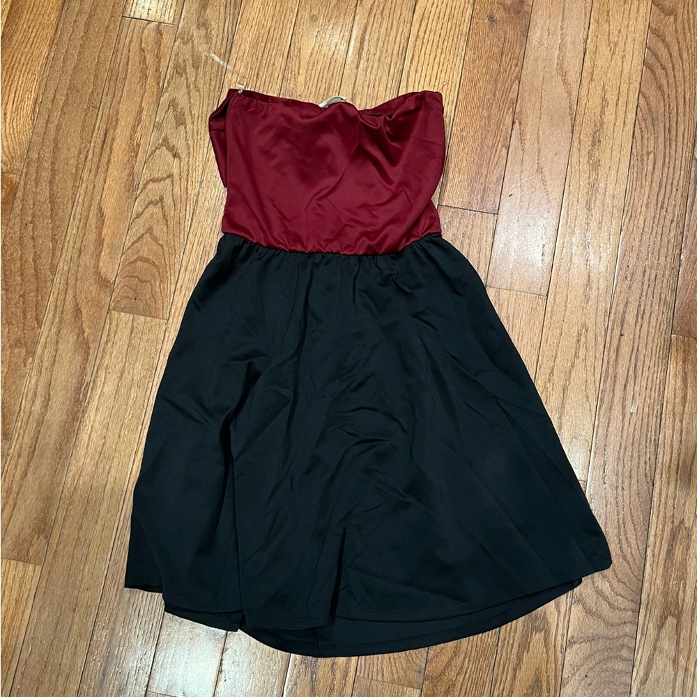 Black and burgundy or Garnet dress strapless with a bow on the back Brand New